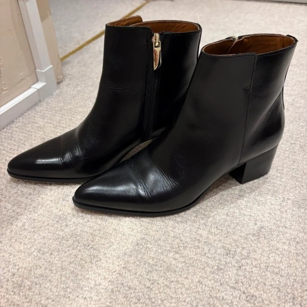 Sleek Black Leather Heeled Boots